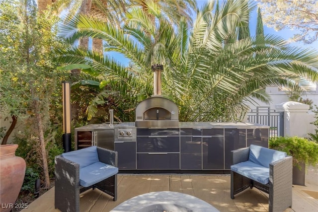 8109 Moonstone Cir, Las Vegas, NV 89128 - view of patio / terrace with exterior kitchen