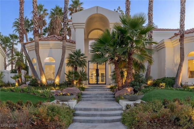 8109 Moonstone Cir, Las Vegas, NV 89128 - doorway to property with french doors, stucco siding, and a tiled roof
