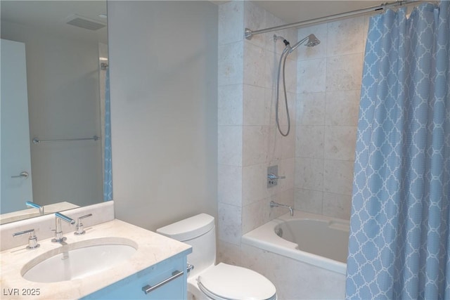 222 Karen Ave Unit 708, Las Vegas, NV 89109 - full bathroom with toilet, visible vents, vanity, and shower / bath combo with shower curtain