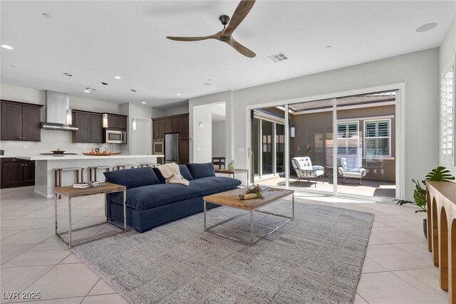 18 Via Tiberina, Henderson, NV 89011 - living room with light tile patterned floors, ceiling fan, and recessed lighting