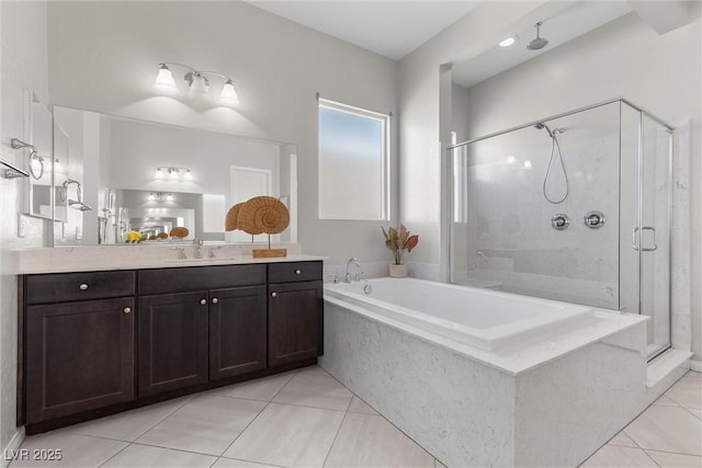 18 Via Tiberina, Henderson, NV 89011 - bathroom with a stall shower, vanity, a garden tub, and tile patterned flooring