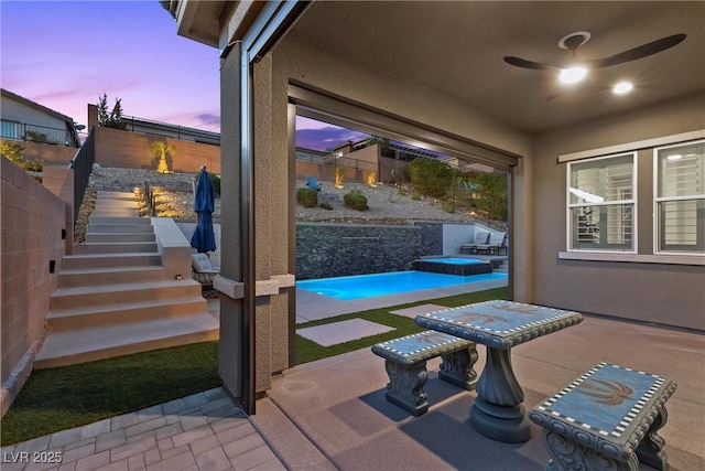 18 Via Tiberina, Henderson, NV 89011 - view of patio featuring stairway and a fenced backyard