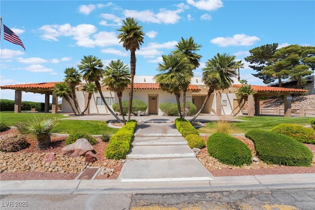 6861 E Washington Ave, Las Vegas, NV 89110 - mediterranean / spanish home featuring stucco siding and a tile roof