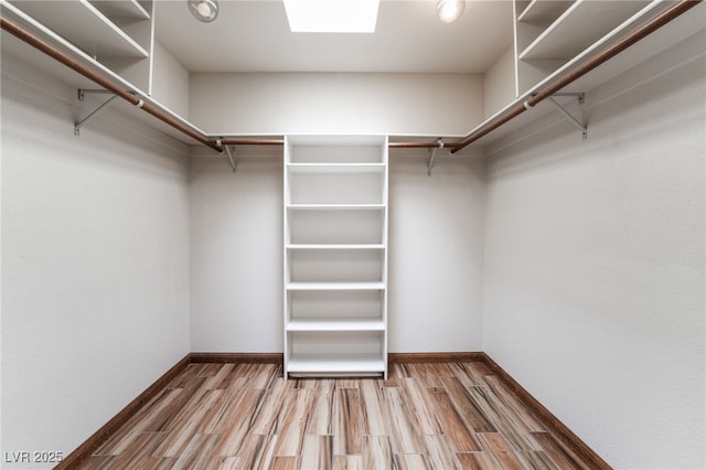 6861 E Washington Ave, Las Vegas, NV 89110 - walk in closet featuring wood finished floors