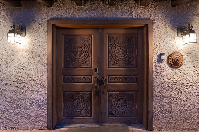 6861 E Washington Ave, Las Vegas, NV 89110 - doorway to property featuring stucco siding
