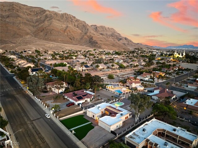 6861 E Washington Ave, Las Vegas, NV 89110 - aerial view of property's location with mountains and nearby suburban area