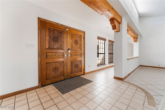 6861 E Washington Ave, Las Vegas, NV 89110 - foyer entrance with light tile patterned floors and baseboards