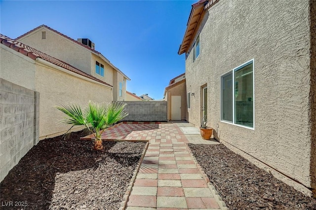 view of yard with a patio and a fenced backyard