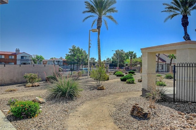 view of yard featuring fence