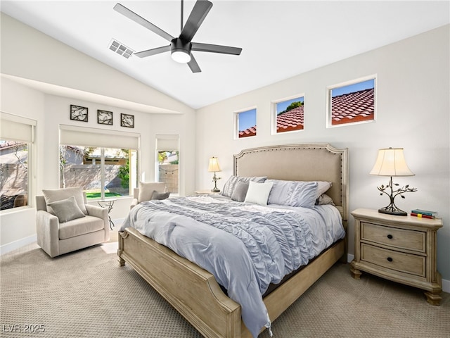bedroom featuring visible vents, carpet floors, lofted ceiling, baseboards, and a ceiling fan
