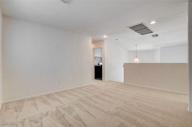 unfurnished room with light carpet, recessed lighting, baseboards, and vaulted ceiling