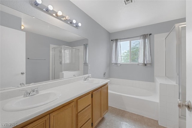 8005 Exploration Ave, Las Vegas, NV 89131 - bathroom featuring a garden tub, visible vents, a sink, and a shower stall