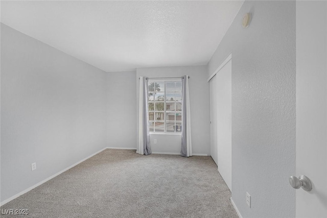 8005 Exploration Ave, Las Vegas, NV 89131 - spare room with baseboards and carpet