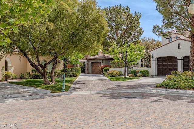 11814 Canons Brook Dr, Las Vegas, NV 89141 - view of front of home with a tile roof and stucco siding