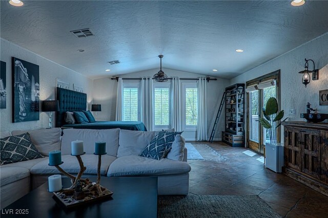 11814 Canons Brook Dr, Las Vegas, NV 89141 - living room with recessed lighting, visible vents, stone tile floors, and lofted ceiling