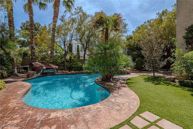 11814 Canons Brook Dr, Las Vegas, NV 89141 - outdoor pool featuring a yard and a patio
