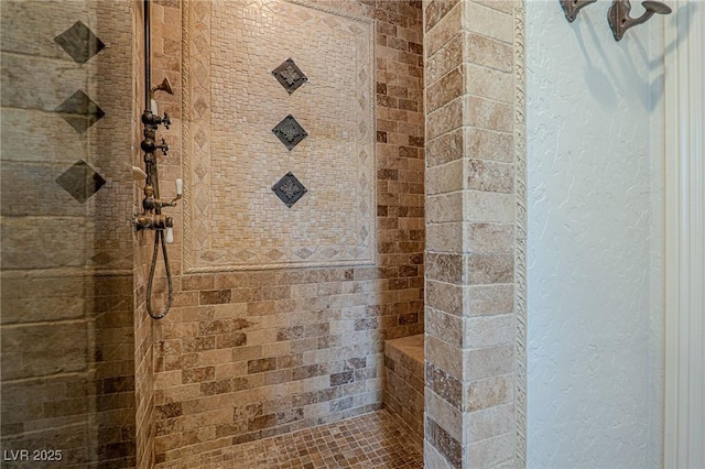 11814 Canons Brook Dr, Las Vegas, NV 89141 - bathroom featuring a textured wall and tiled shower