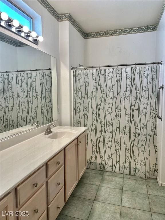 full bath with tile patterned flooring and vanity
