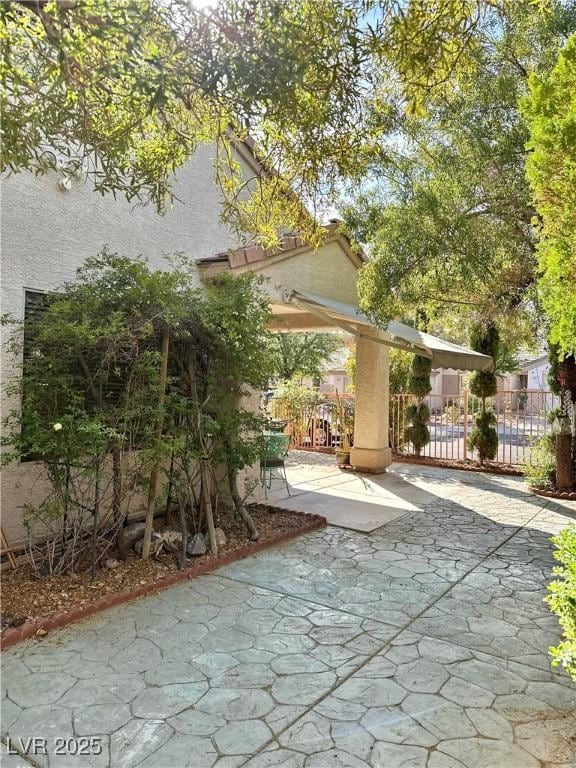 view of patio / terrace with fence