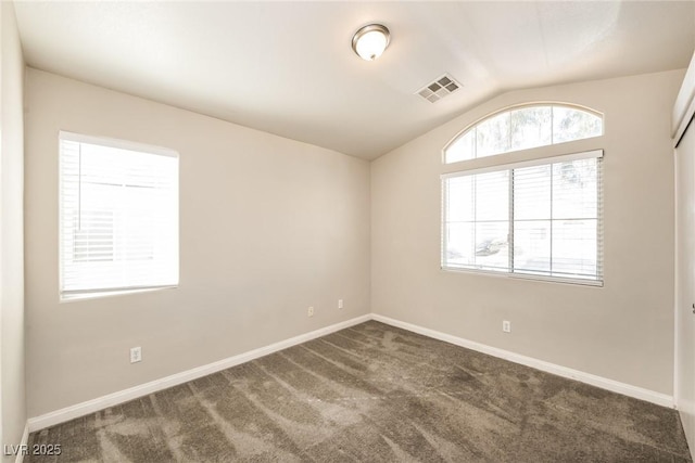 3434 Denali Preserve St, Las Vegas, NV 89122 - spare room with carpet flooring, visible vents, baseboards, and lofted ceiling