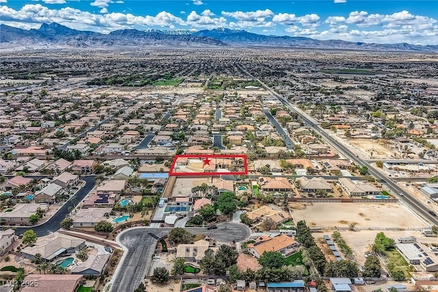 aerial view with a residential view and a mountain view