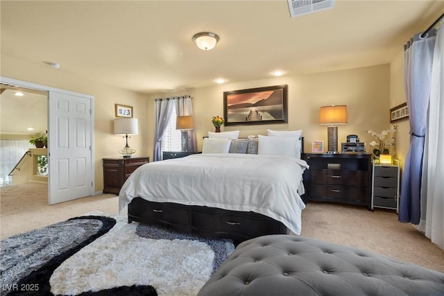 carpeted bedroom featuring visible vents and recessed lighting