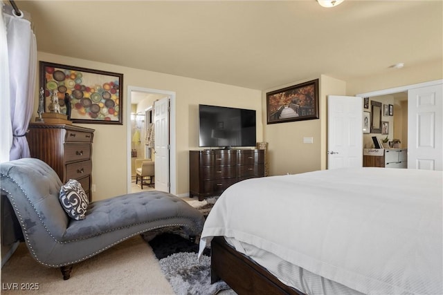 bedroom featuring ensuite bath