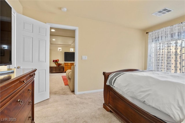 bedroom featuring light carpet, recessed lighting, visible vents, and baseboards
