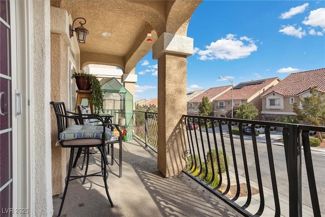 balcony featuring a residential view