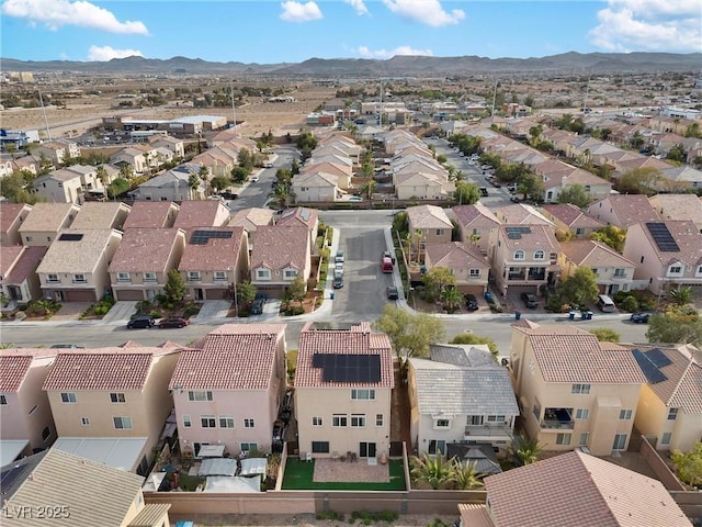bird's eye view with a mountain view and a residential view