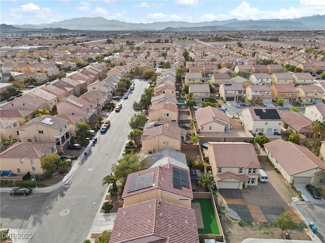 bird's eye view with a residential view and a mountain view