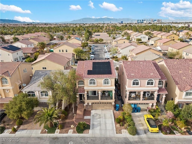 bird's eye view featuring a mountain view and a residential view