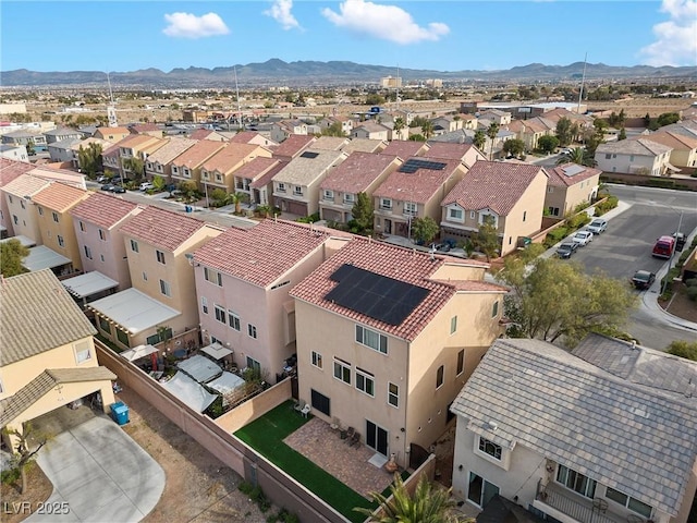 bird's eye view featuring a mountain view and a residential view