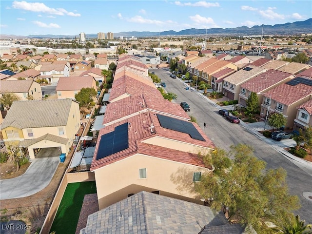 bird's eye view featuring a residential view and a mountain view