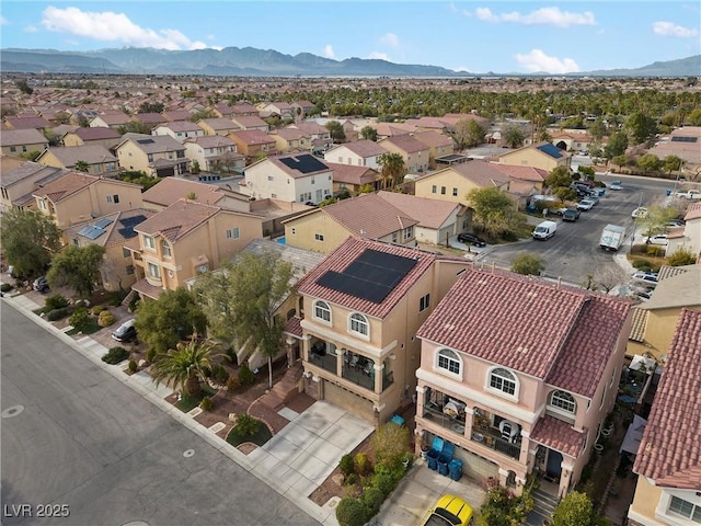 bird's eye view featuring a residential view and a mountain view