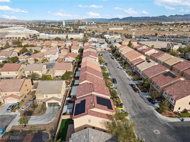 drone / aerial view featuring a mountain view and a residential view