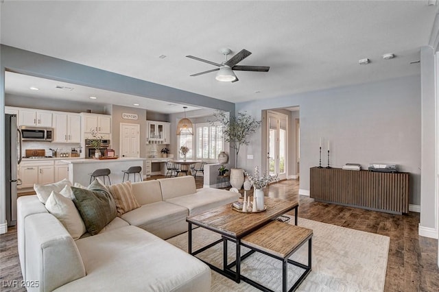 11342 Early Sun Ct, Las Vegas, NV 89135 - living area with wood finished floors, baseboards, a ceiling fan, and recessed lighting
