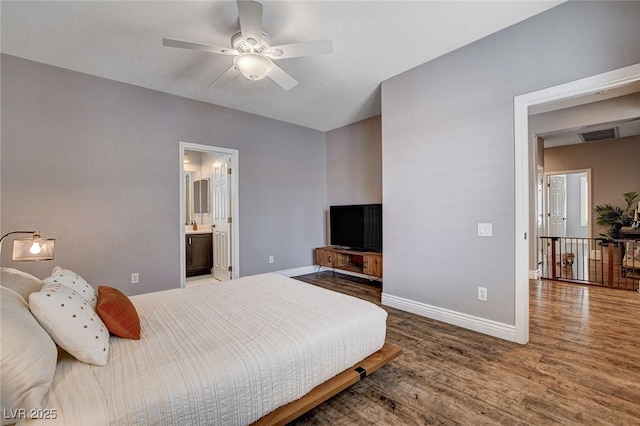 11342 Early Sun Ct, Las Vegas, NV 89135 - bedroom featuring wood finished floors, baseboards, and visible vents