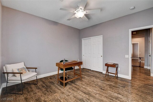 11342 Early Sun Ct, Las Vegas, NV 89135 - sitting room featuring ceiling fan, baseboards, and wood finished floors