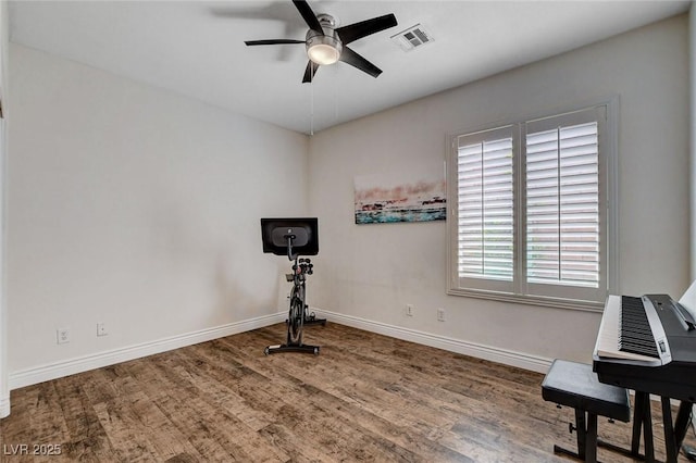 11342 Early Sun Ct, Las Vegas, NV 89135 - workout area featuring wood finished floors, ceiling fan, baseboards, and visible vents