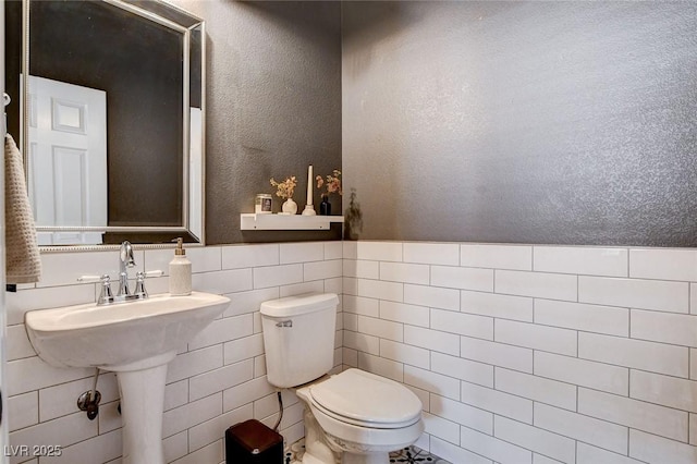 11342 Early Sun Ct, Las Vegas, NV 89135 - bathroom featuring tile walls and toilet
