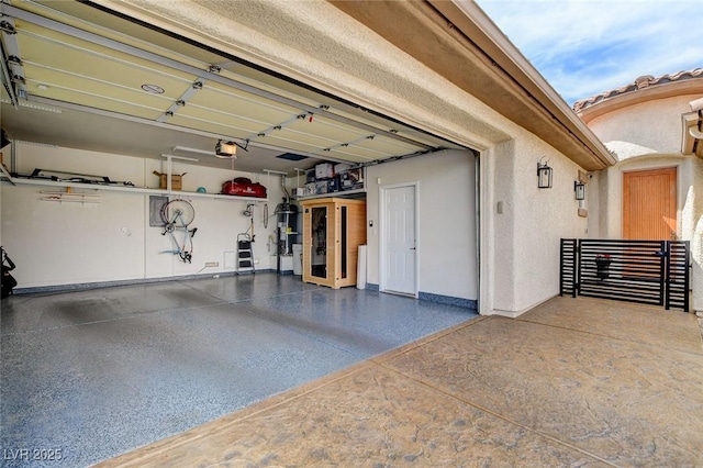 11342 Early Sun Ct, Las Vegas, NV 89135 - garage featuring a garage door opener