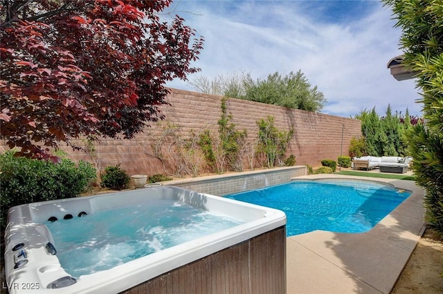 11342 Early Sun Ct, Las Vegas, NV 89135 - view of swimming pool with a fenced backyard, a patio area, a hot tub, and an outdoor hangout area