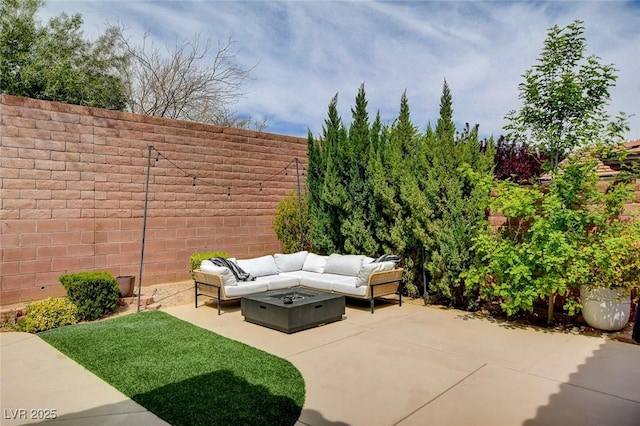 11342 Early Sun Ct, Las Vegas, NV 89135 - view of patio with fence and an outdoor living space with a fire pit