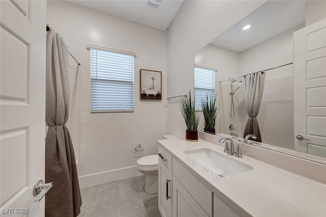 93 Reverie Heights Ave, Henderson, NV 89011 - full bath with toilet, vanity, baseboards, and curtained shower