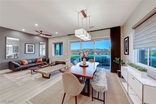 93 Reverie Heights Ave, Henderson, NV 89011 - dining room with light wood finished floors, ceiling fan, visible vents, and recessed lighting