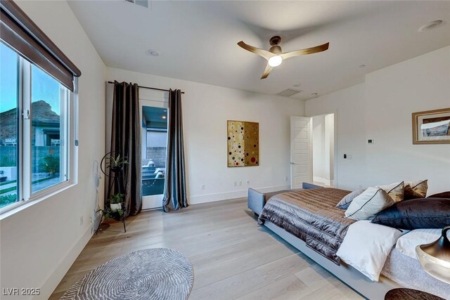 93 Reverie Heights Ave, Henderson, NV 89011 - bedroom featuring light wood finished floors, visible vents, baseboards, and ceiling fan
