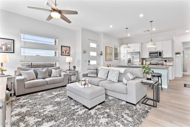 916 Belleforte Ln, Las Vegas, NV 89138 - living room with light wood finished floors, a ceiling fan, and recessed lighting
