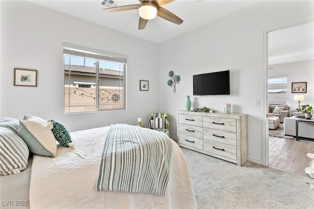 916 Belleforte Ln, Las Vegas, NV 89138 - carpeted bedroom featuring multiple windows and ceiling fan