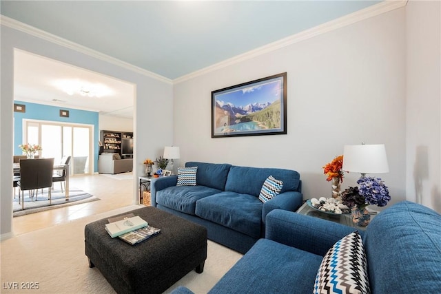 living area with crown molding